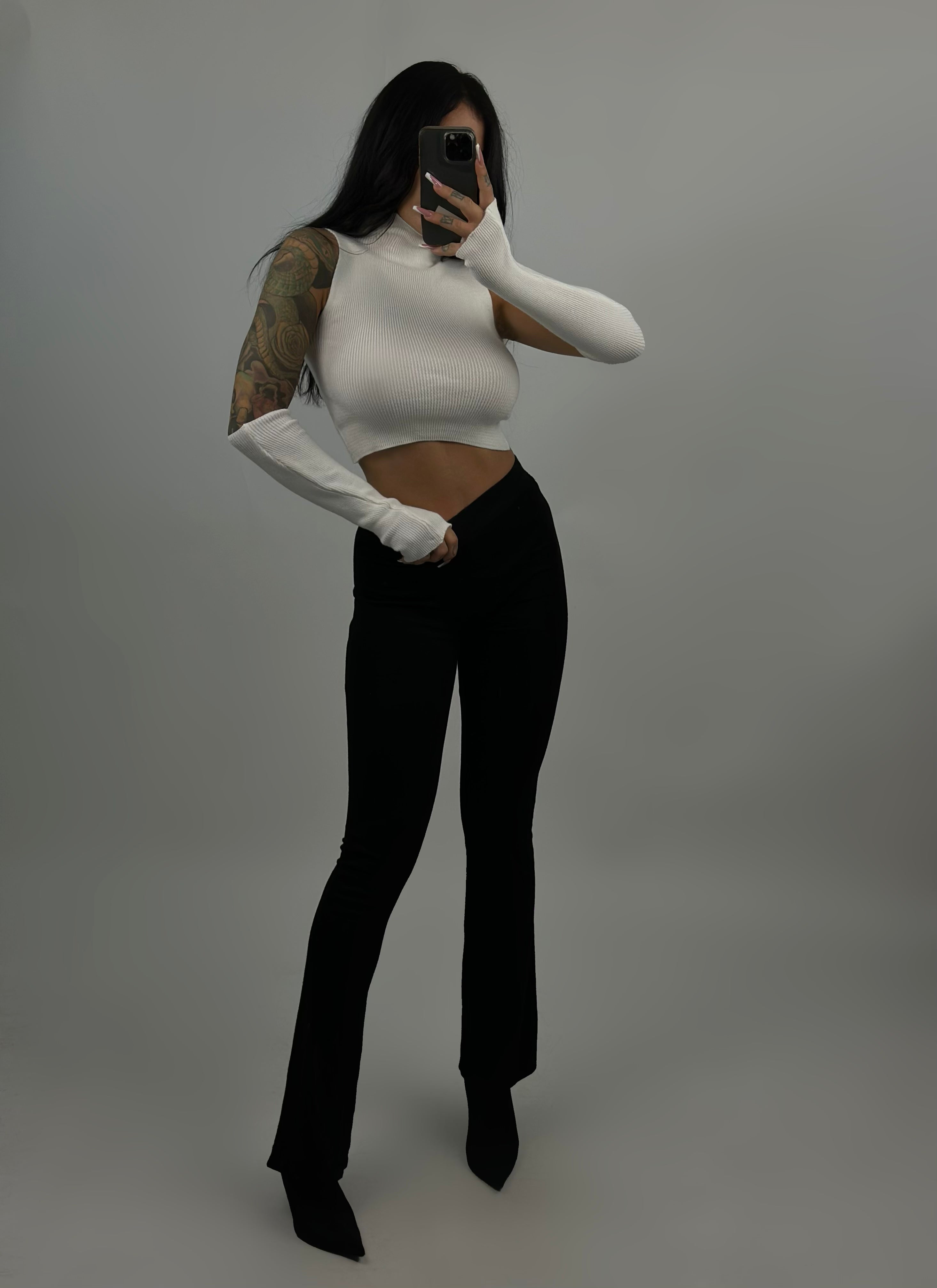 Maglia collo alto con manicotti